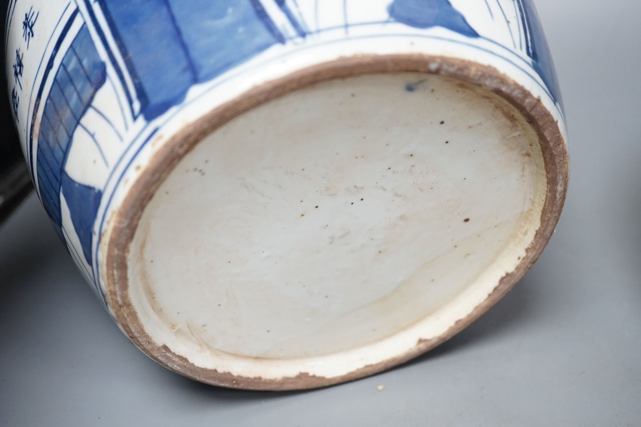 A pair of Chinese blue and white ovoid jars and covers, 25cm